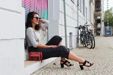 denim culotte wide pants trousers about you noisy may sandals oasis tassels scrappy black heels wrapped top body shirt summer streetstyle spring berlin blogger samieze grey club master ray ban
