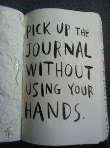 Pick up the Journal without using your hands