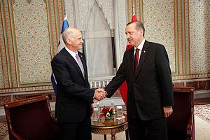 Greece's Prime Minister George Papandreou (L) ...