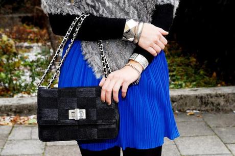Monday to go: fur poncho and studded heels