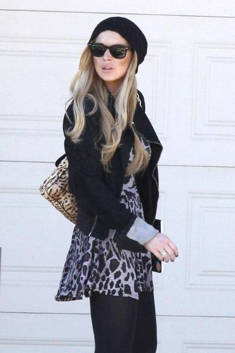 47843, LOS ANGELES, CALIFORNIA - Wednesday November 24, 2010. Lindsay Lohan, wearing an animal print dress, black blazer, knit hat and cowboy boots, heads off to the Betty Ford Clinic for treatment. Dina Lohan is reportedly trying to get permission for her daughter Lindsay to spend Thanksgiving in New York with her family. Photograph:  David Tonnessen, PacificCoastNews.com