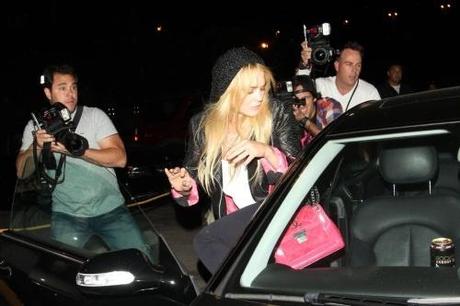 41910, WEST HOLLYWOOD, CALIFORNIA - Wednesday June 23 2010. Lindsay Lohan continues her noctural lifestyle with a visit to the Las Palmas club in West Hollywood. The young actress, who is currently wearing an alcohol-monitoring bracelet, is schduled to appear in court on July 6 for a hearing to determine whether or not Lohan had violated her probation stemming from an earlier DUI conviction. Photograph:  Hellmuth Dominguez, PacificCoastNews.com