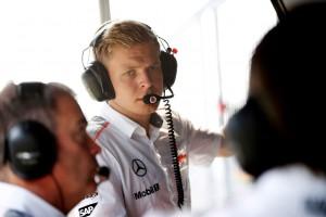 Kevin Magnussen on the pit wall