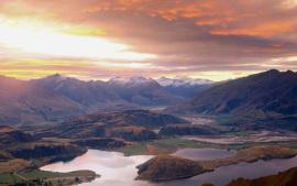 Sunset over Lake Wanaka. Mt. Aspiring in distance from Mt. Roy. Central Otago. New Zealand.