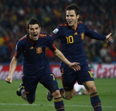 July 03, 2010 - Johannesburg, South Africa - epa02235850 Spain's David Villa (L) and Cesc Fabregas (R) celebrate Villas goal during the FIFA World Cup 2010 quarter final match between Paraguay and Spain at the Ellis Park stadium in Johannesburg, South Africa, 03 July 2010.
