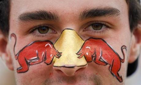 Mar. 27, 2010 - Melbourne, Australia - epa02095916 A man has the Red Bull logo painted on his face before the Australian Formula 1 Grand Prix at the Albert Park circuit in Melbourne, Australia, 28 March 2010.