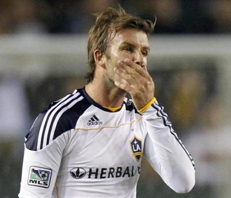Los Angeles Galaxy midfielder David Beckham reacts during the second half of their MLS soccer match against Columbus Crew in Carson, California, September 11, 2010. REUTERS/Lucy Nicholson (UNITED STATES - Tags: SPORT SOCCER)