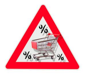 Prozente mit Einkaufswagen in einem Warnschild
