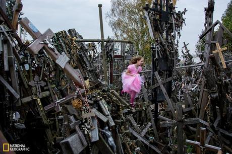 This photo was taken in Siauliai, Lithuania. There are about 100,000 crosses in the hill. Many people pray for god and mourned the death of people killed by war. When I visited here, a girl ran through the hill of crosses. It was a strange sight.