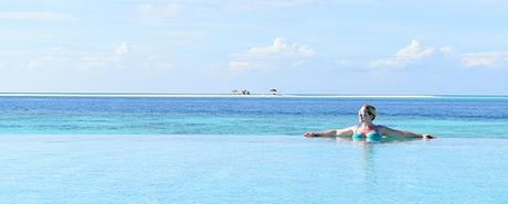 Hurawalhi Island Resort Malediven Pool und Meer