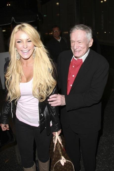48393, LOS ANGELES, CALIFORNIA - Thursday December 9 2010. Hugh Hefner with his girlfriend Crystal Harris and his son Cooper Hefner leaving Katsuya in Hollywood. The Playboy millionaire reportedly stunned staff by taking his own food - a baked potato and pork chops - to the restaurant! Photograph: Greg Tidwell, PacificCoastNews.com