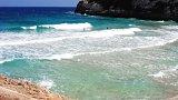 Wellen an der Playa Romantica