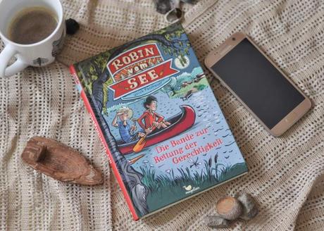 Mit dem Boot auf dem See: Kinder, Reisen, Abenteuer - diese vier Roatrip-Bücher für Kinder ab 8 Jahren sind voll gepackt mit Abenteuer. und zwar aus ganz unterschiedlichen Gründen. #roadtrip #abenteuer #lesen #kinderbuch #wal #kater #robin #berlin