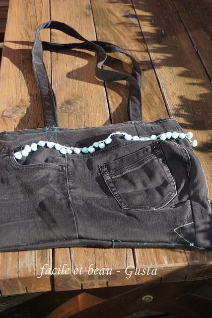 Tasche Jeans mit blauen Pompoms