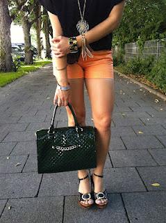 Monday to go: orange shorts with black lace top