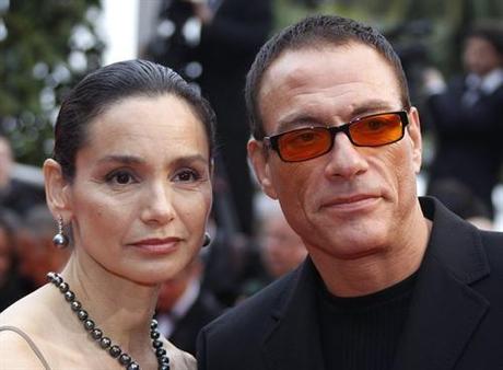 Actor Jean-Claude Van Damme (R) and his wife Gladys (L) arrive on the red carpet for the screening of the film You will meet a tall dark stranger at the 63rd Cannes Film Festival May 15, 2010. REUTERS/Eric Gaillard (FRANCE - Tags: ENTERTAINMENT)