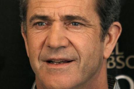 Actor Mel Gibson poses during a photocall for the film Edge of Darkness by director Martin Campbell in Paris, in this February 4, 2010 file photo. Gibson, who caused a media storm four years ago over an anti-semitic statement, is again making headlines for using an apparent racial slur in an argument with his ex-girlfriend, according to excerpts published by celebrity news website Radaronline.com, on July 1, 2010. REUTERS/Charles Platiau/Files (FRANCE - Tags: ENTERTAINMENT HEADSHOT)
