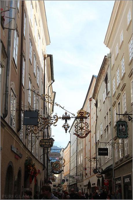 Salzburg - city of Salzburg - historic Getreidegasse with stores left and right