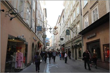 Salzburg - city of Salzburg - historic Getreidegasse with stores left and right