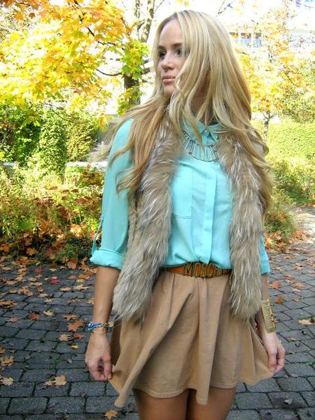 Saturday to go: fur vest with turquoise studded blouse
