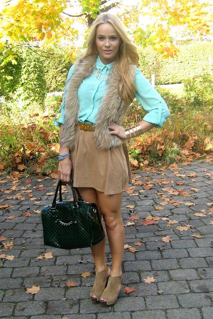 Saturday to go: fur vest with turquoise studded blouse