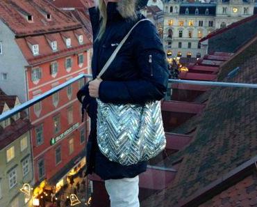 Blue Jacket / Cream Pants / Sequin Bag for shopping in Graz