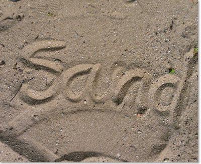 Schreibe es in den Sand!