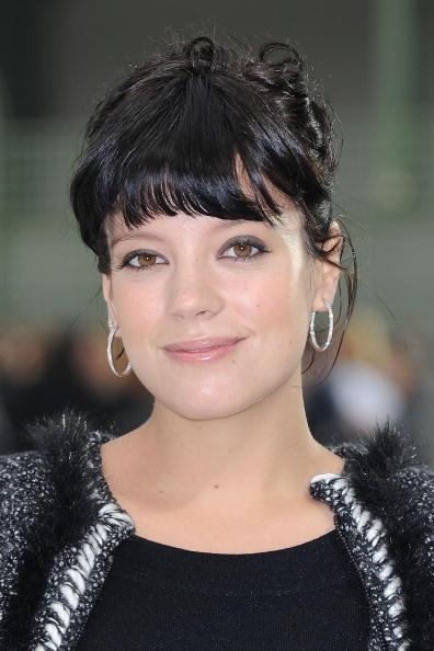 PARIS - OCTOBER 05: Lily Allen attends the Chanel Ready to Wear Spring/Summer 2011 show during Paris Fashion Week at Grand Palais on October 5, 2010 in Paris, France. (Photo by Pascal Le Segretain/Getty Images)