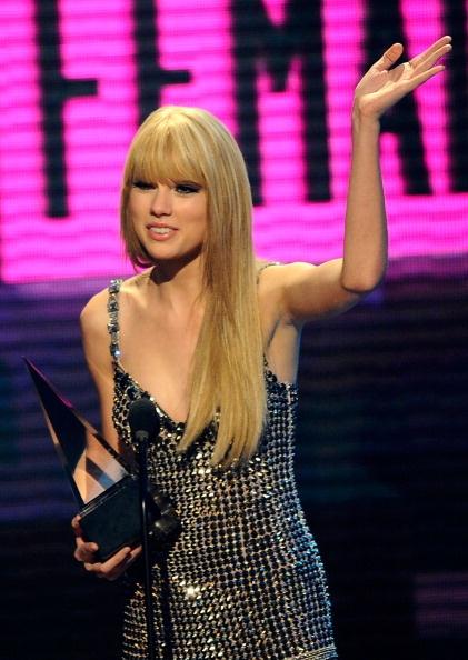 LOS ANGELES, CA - NOVEMBER 21: Singer Taylor Swift accepts the Country Music - Favorite Female Artist award onstage during the 2010 American Music Awards held at Nokia Theatre L.A. Live on November 21, 2010 in Los Angeles, California. (Photo by Kevork Djansezian/Getty Images for DCP)
