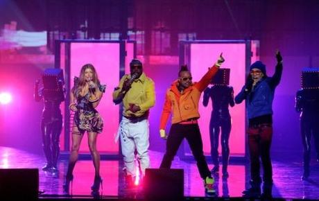 LOS ANGELES, CA - NOVEMBER 21: Singers Fergie, will.i.am, apl.de.ap, and Taboo of the Black Eyed Peas perform onstage during the 2010 American Music Awards held at Nokia Theatre L.A. Live on November 21, 2010 in Los Angeles, California. (Photo by Kevork Djansezian/Getty Images for DCP)
