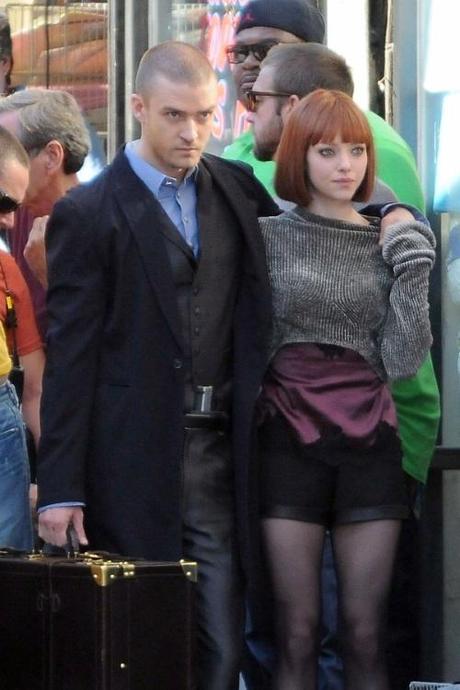 47520, LOS ANGELES, CALIFORNIA - Monday November 15, 2010. Justin Timberlake and Amanda Seyfried film a scene together for their upcoming science fiction movie Now . In the scene, Timberlake wore a long coat and carried a large suitcase as he walked arm in arm with a scantily clad Seyfried. Photograph:  Hector Vasquez, PacificCoastNews.com