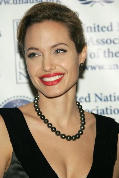 NEW YORK - OCTOBER 11:  Actress Angelina Jolie arrives at the United Nations Association (UNA) annual gala dinner at the Waldorf Astoria Hotel October 11, 2005 in New York City.  Jolie received the Global Humanitarian Award from the United Nations Association of the U.S.A. for her humanitarian work as a goodwill ambassador for the  United Nations refugee agency.  (Photo by Evan Agostini/Getty Images)