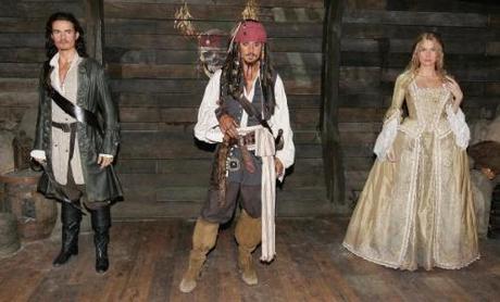 LONDON - JULY 05:  (L-R) Waxwork models of Orlando Bloom as Will Turner, Johnny Depp as Captain Jack Sparrow and Keira Knightly as Elizabeth Swan from Pirates of The Caribbean: Dead Man's Chest form part of an interactive attraction at Madame Tussauds on July 5, 2006 in London, England. (Photo by Gareth Cattermole/Getty Images)