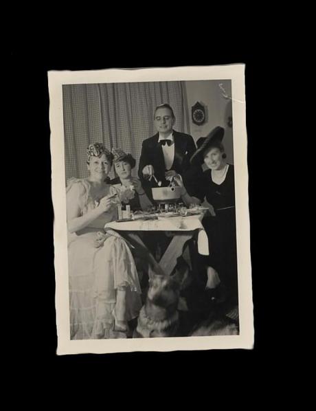 found old photograph from 1920s featuring people having a fondue party