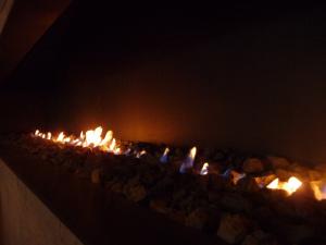 Kaminfeuer eines Ethanolkamin im Hotel - Bild: Sporthotel Achental
