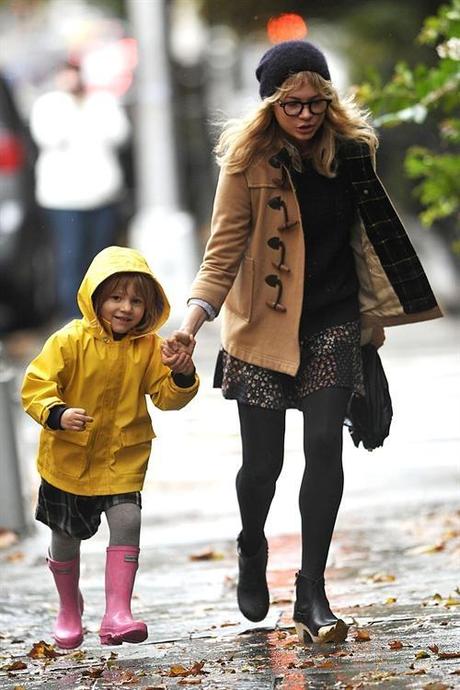 35214, NEW YORK, NEW YORK - Michelle Williams and daughter Matilda Ledger continue their rainy day in Brooklyn at Bar Tabac restaurant and The Urban Gardener. Daughter Matilda looked too cute for words in her yellow raincoat, pink wellies, and gray stockings. Photograph: PacificCoastNews.com