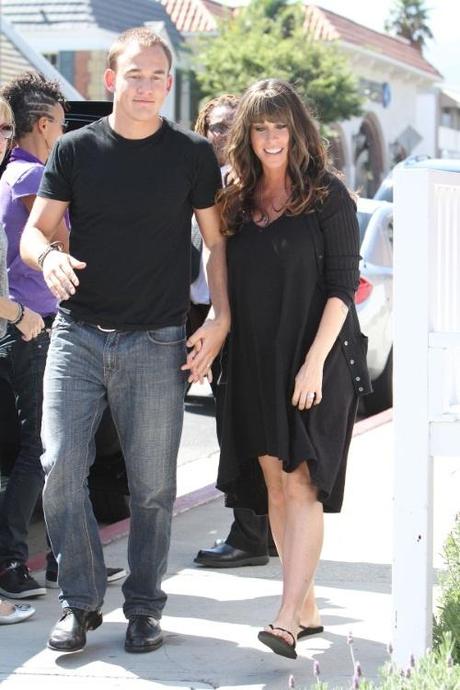 43486, LOS ANGELES, CALIFORNIA - Wednesday August 11, 2010. A pregnant Alanis Morissette goes for coffee with her husband Mario Treadway AKA Souleye go for a cup of coffee after making an appearance on Chelsea Lately . Treadway could be seen touching Morrissette's growing belly as they exited their car in front of the coffee shop. Photograph:  Anthony, PacificCoastNews.com