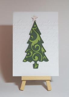 Die Weihnachtskarte mit dem verschnörkelten Baum...
