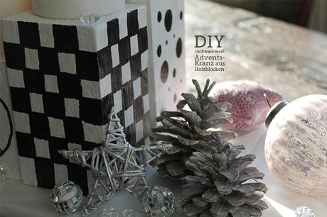 DIY: Adventskranz aus Holzblöcken in schwarz-weiß