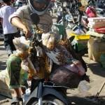 Hühnertransport mit dem Motorrad