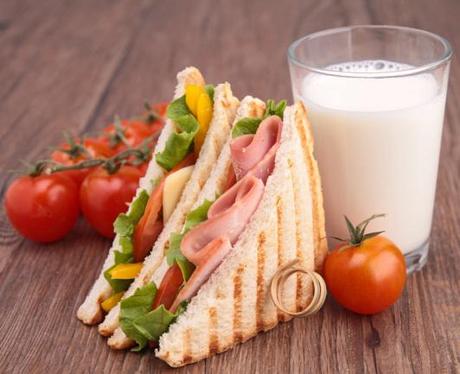 club sandwich and milk glass