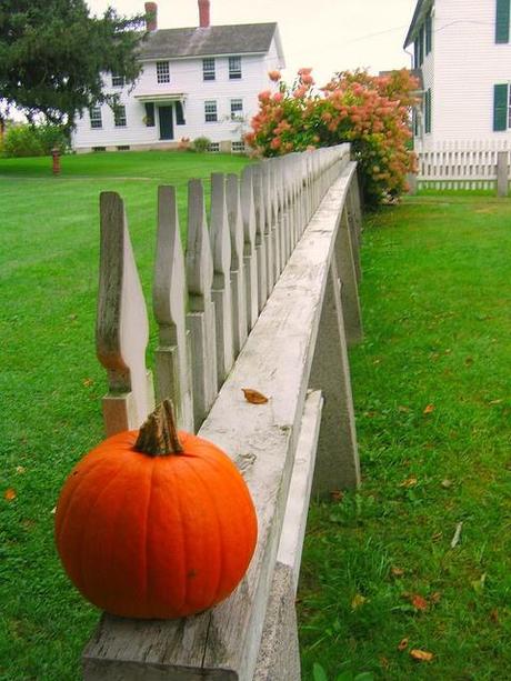 the fence around the Meeting house looking the the Ministry Shop on the right and the Children's Shop straight ahead; Canterbury Shaker village, Canterbury, New Hampshire.