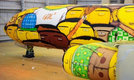 os gemeos graffitis boeing 737 for team brazil's FIFA world cup travel