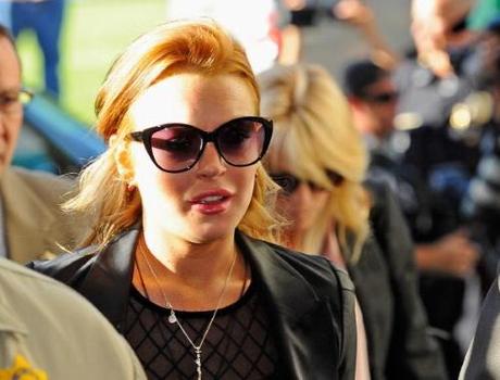 BEVERLY HILLS, CA - SEPTEMBER 24: Actress Lindsay Lohan escorted by Los Angeles County Sheriff Deputies arrives for a mandatory court appearance before a judge who revoked her probation earlier this week at Beverly Hills Courthouse on September 24, 2010 in Beverly Hills, California. Superior Court Judge Elden S. Fox issued a bench warrant for the actress who as on is probation for a pair of driving under the influence cases. (Photo by Kevork Djansezian/Getty Images)