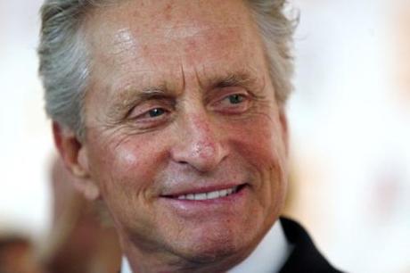 Actor Michael Douglas smiles while being honoured at The Film Society of Lincoln Center's 2010 Chaplin Award Gala in New York City, in this May 24, 2010 file photo. Doctors have found a tumor in the throat of Oscar-winning actor Michael Douglas and plan to treat the Wall Street star with radiation and chemotherapy over eight weeks, according to a story in People magazine dated August 16. Picture taken May 24, 2010. REUTERS/Jessica Rinaldi/Files (UNITED STATES - Tags: ENTERTAINMENT HEADSHOT)