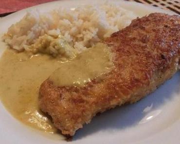 Red Snapper in Kokoskruste mit pikanter Curry-Sauce