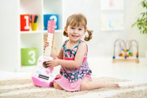 little girl with guitar toy gift