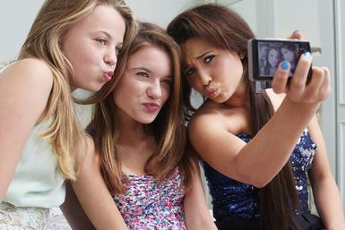 Teenage girls taking a picture