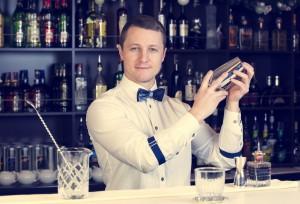 cocktail bartender creating a cocktail in a bar-2
